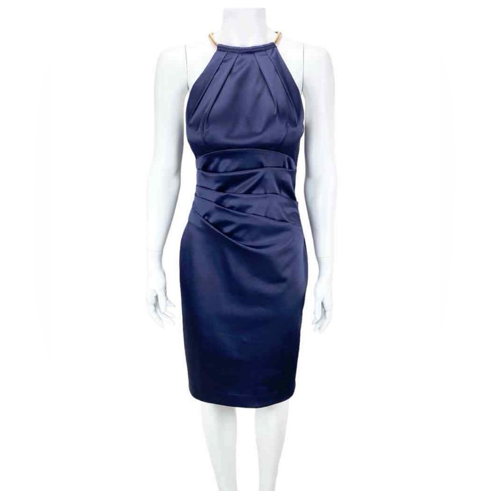 Gorgeous Navy Blue cocktail dress with gold accents.
